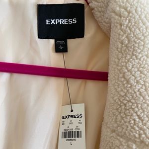 Never worn with tags this Express faux shearling coat is in perfect condition.